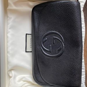 Black Gucci bag purchase at Gucci store.